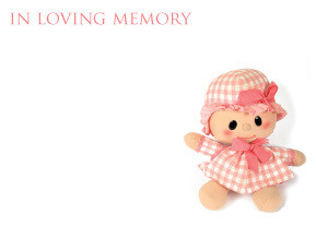 In Loving Memory with Pink Doll