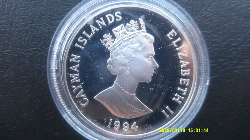 Cayman Islands $1- 1994  (Queen Mothers Coat of Arms) PDHR