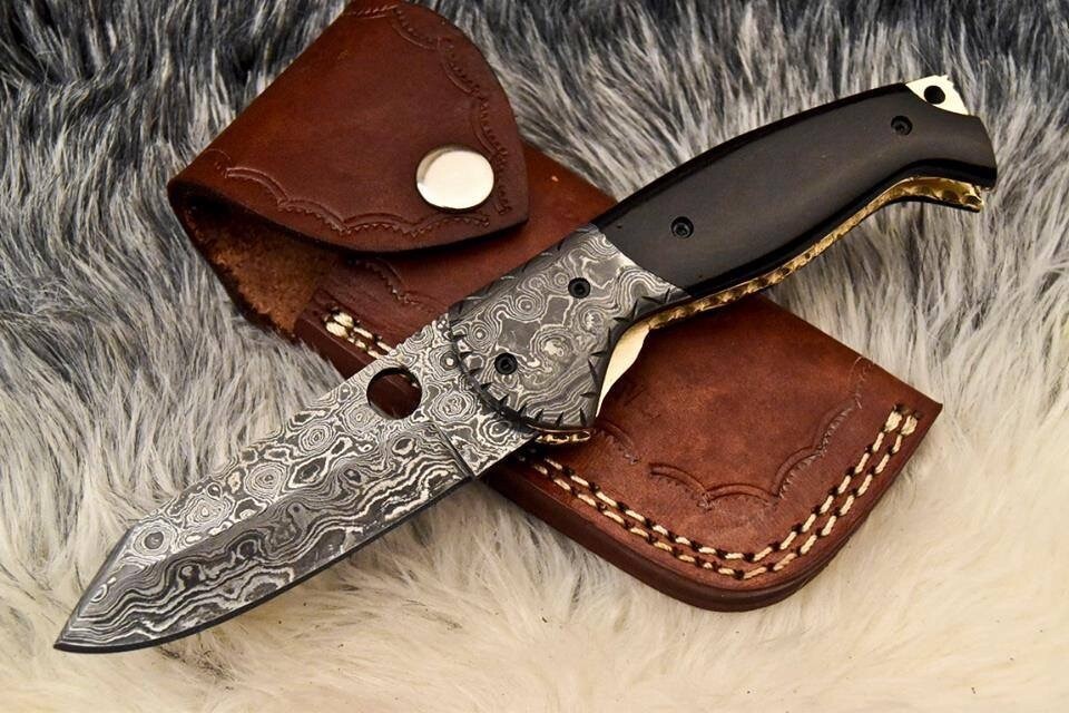 Damascus Folding Knife with bull horn handle 