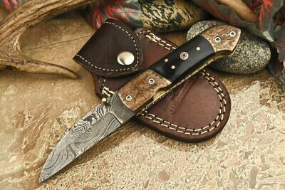 Damascus Folding Knife with bull horn handle 