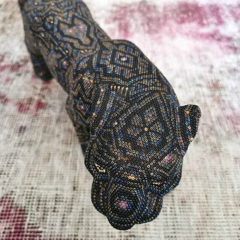 "Black Jaguar figure"