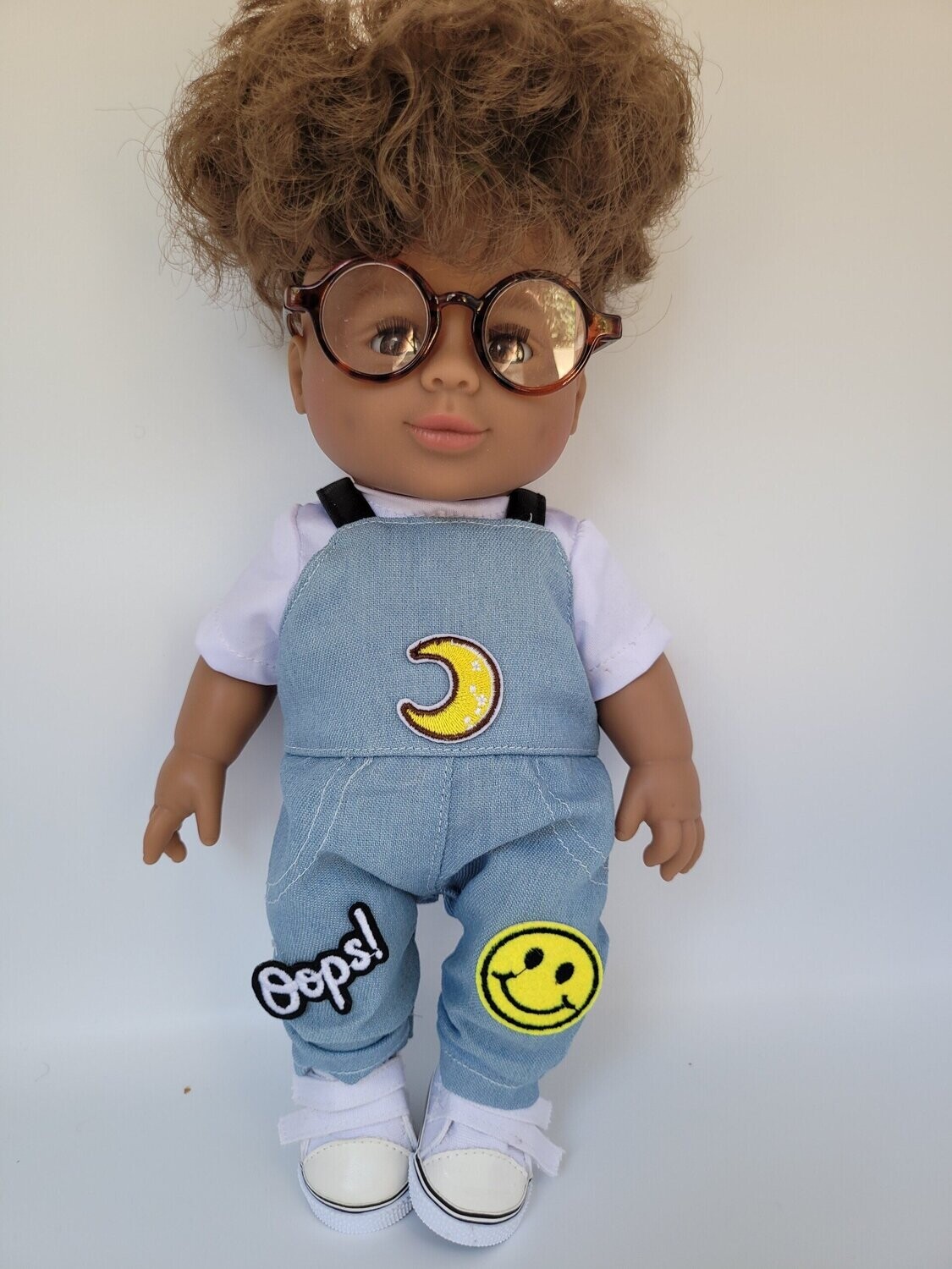 mixed race Simeon wearing Dungarees plus glasses