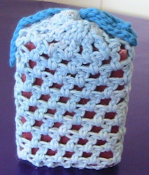 Scented soap in light blue crocheted cover