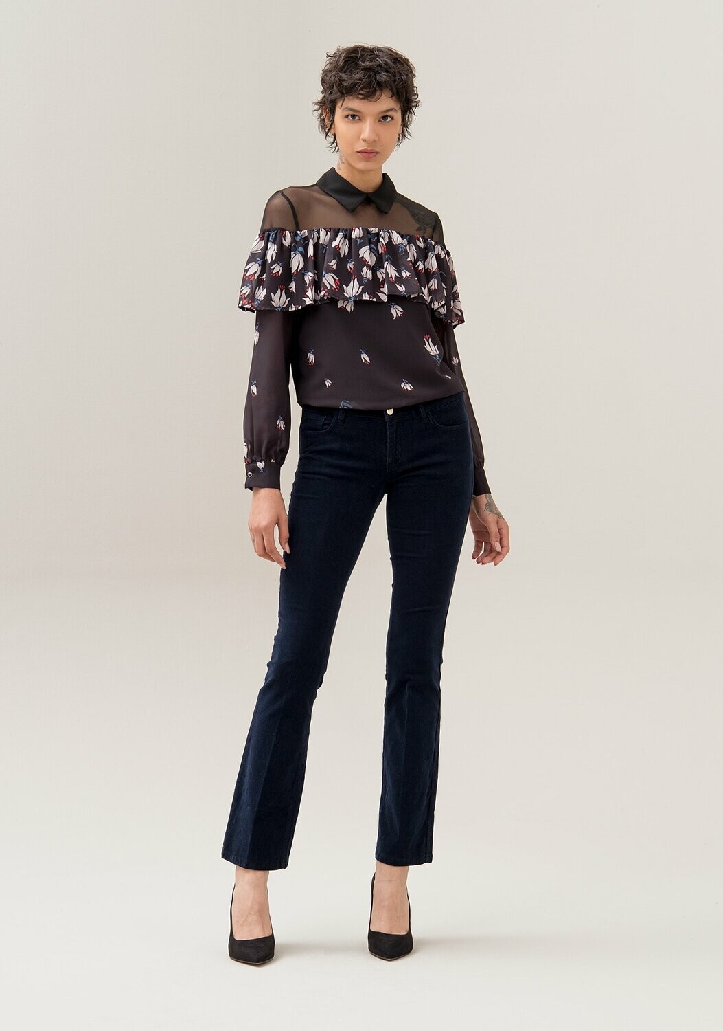 Pantaloni bootcut in velluto millerighe