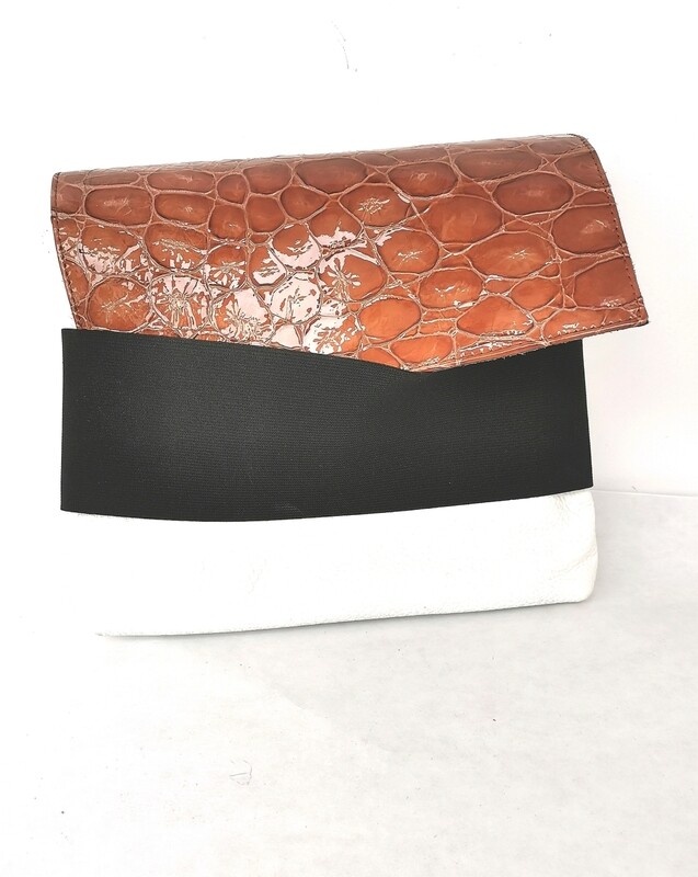 Pochette artigianale in vera pelle