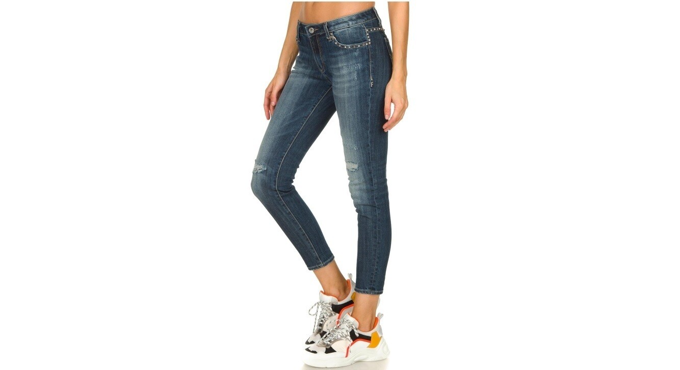 Jeans extra slim con borchie