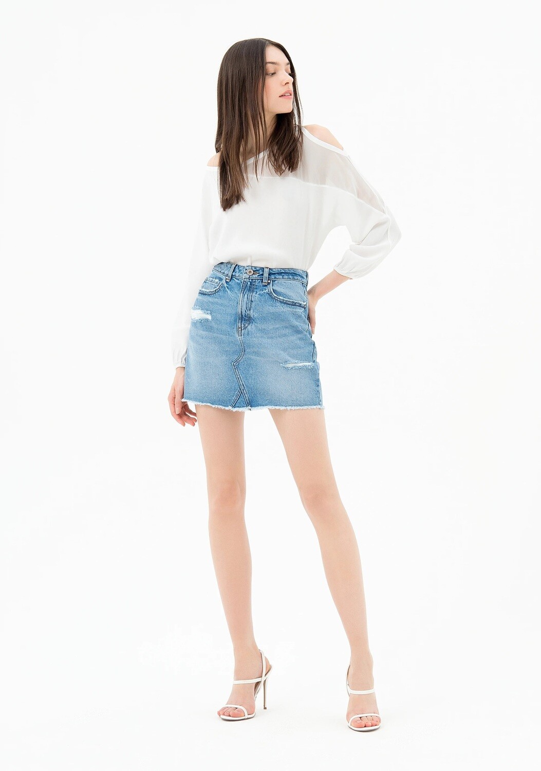 Mini gonna in jeans con rotture