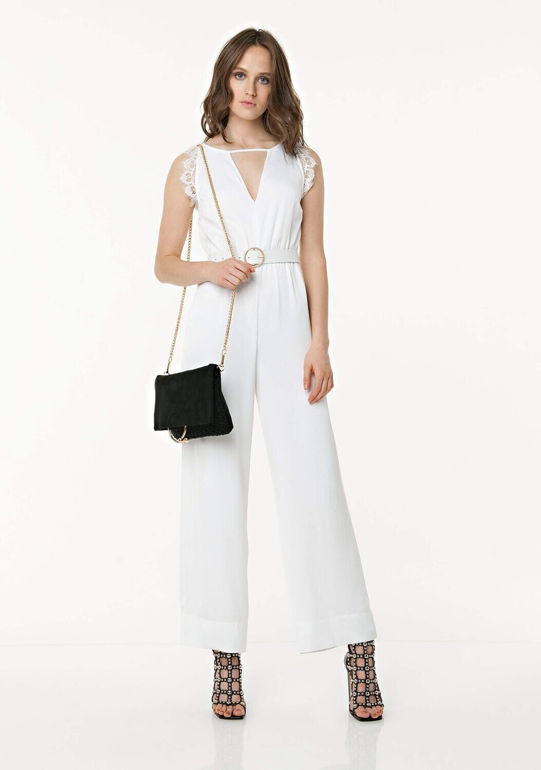 Tuta con pizzo sulla schiena