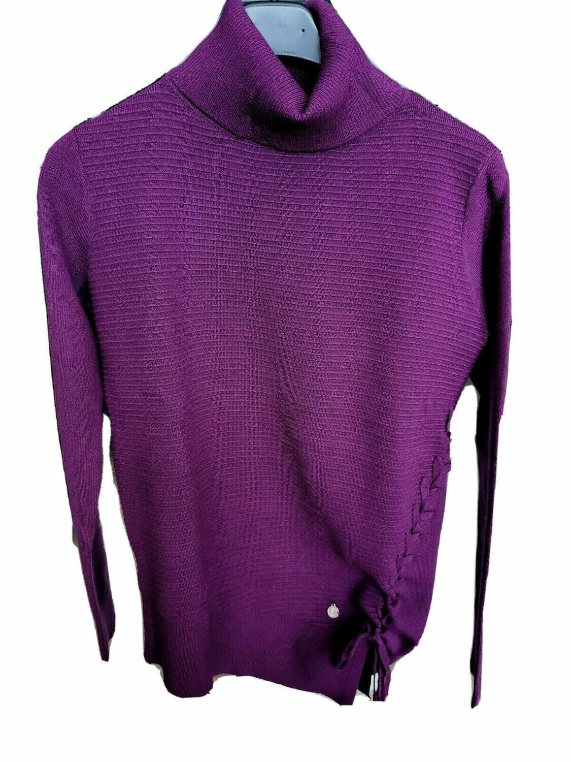 Maglia dolcevita goffrata