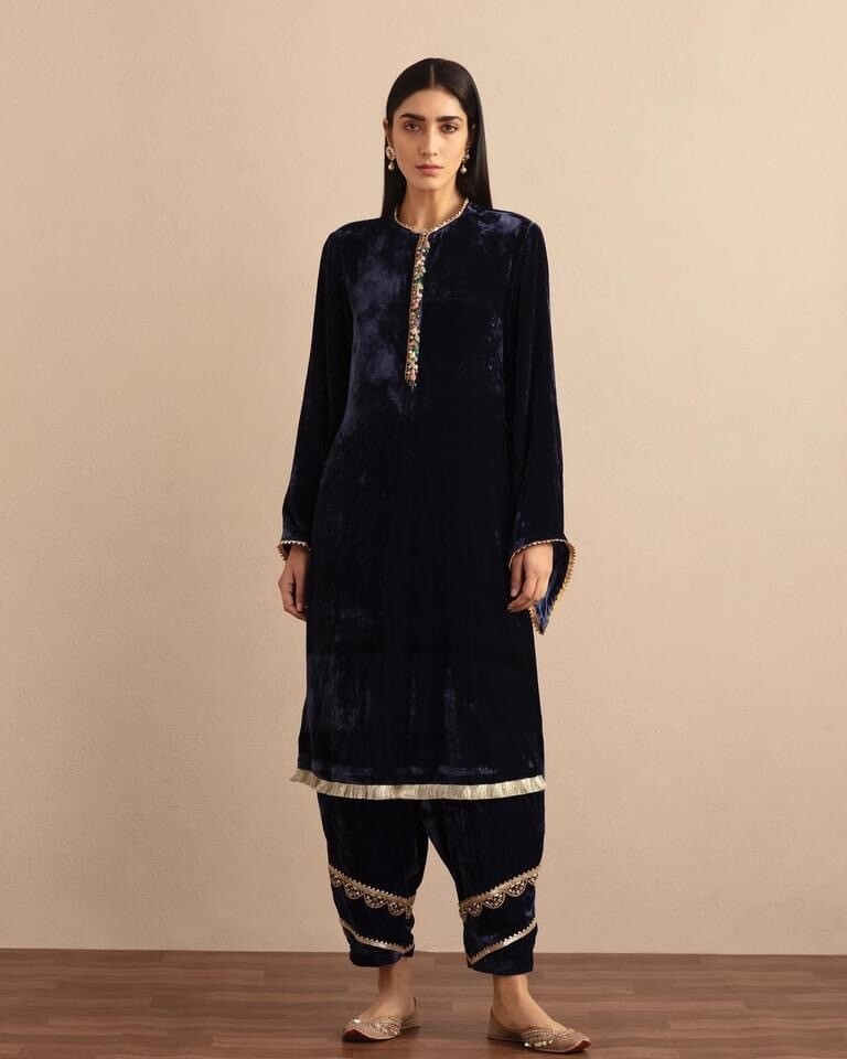 Navy blue silk velvet kurta with jewelled placket detailing paired with embroidered shalwar