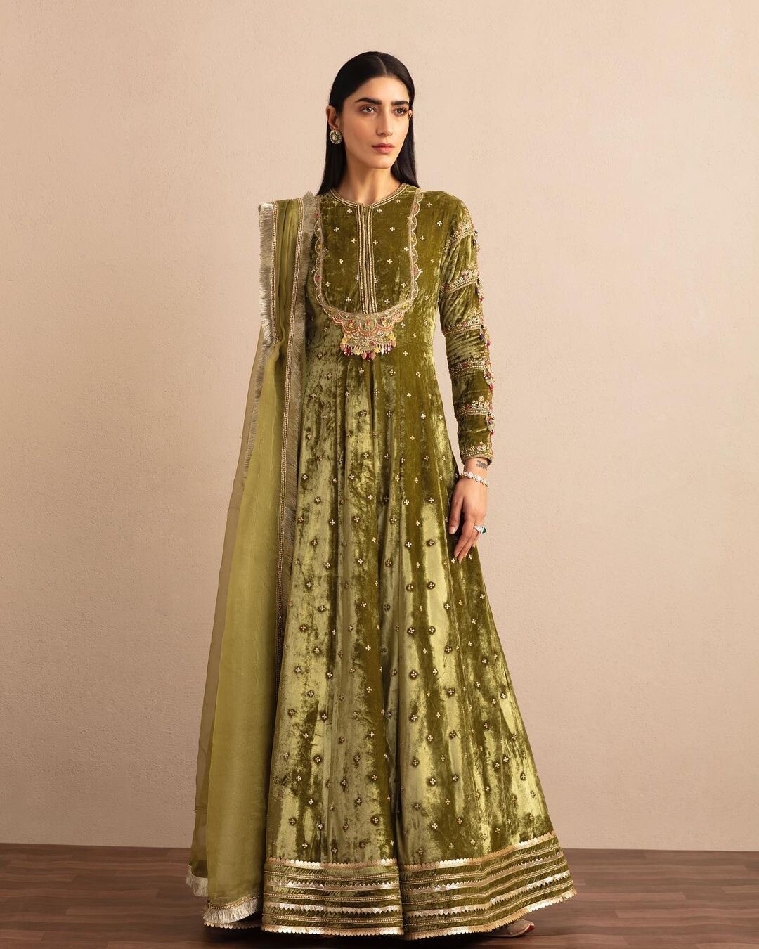Olive Green silk velvet anarkali gown with jewel embellishments &amp; organza dupatta