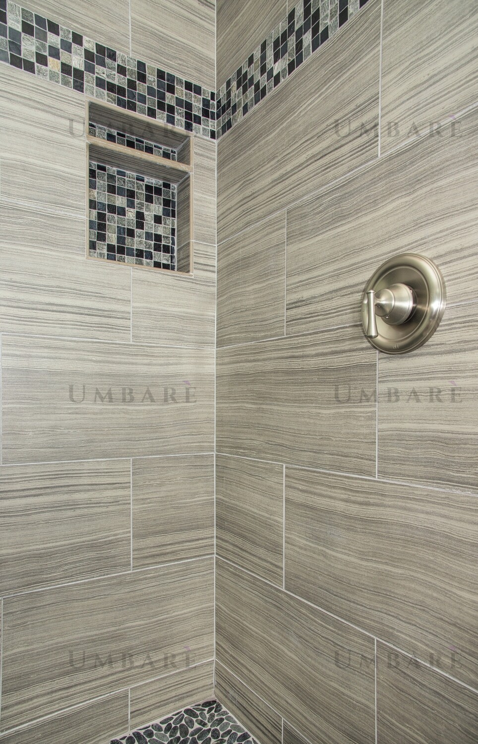 Shower Stall Tiled Walls and Floor with New Showerhead and Controls