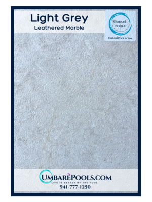 Umbare Pools Pool Builder in Lakewood Ranch Light Grey Leathered Marble Paver 16x24&quot;