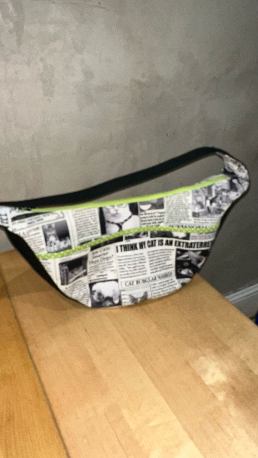 Kitty Newspaper Crescent Handbag