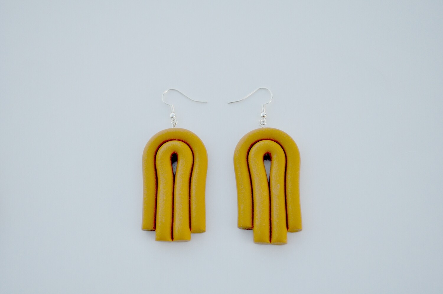 Mustard yellow tassels 