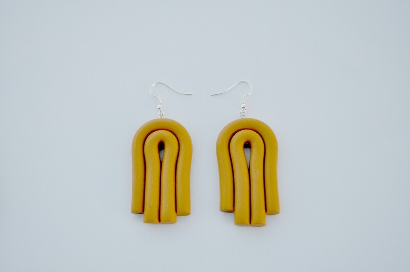 Mustard yellow tassels 