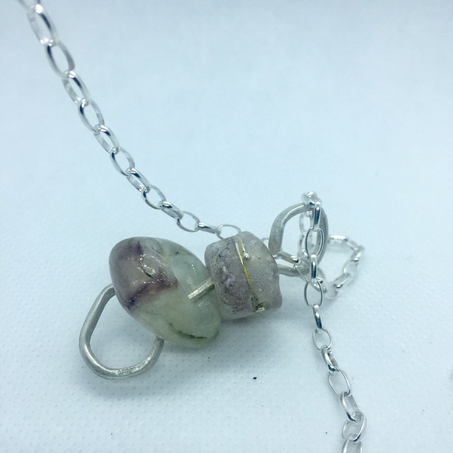 green and purple handmade lampwork glass bead pendant