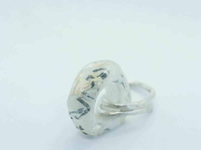 white emubead ring-form on silver link