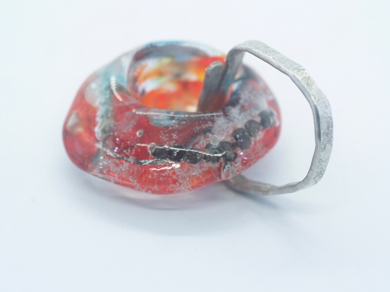 red handmade emubead with inclusions on silver