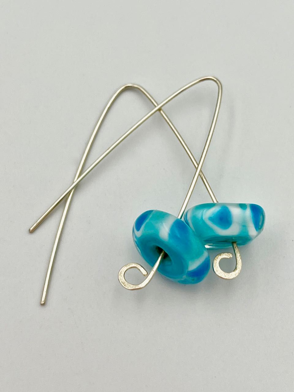 hook earrings with blue patterned beads