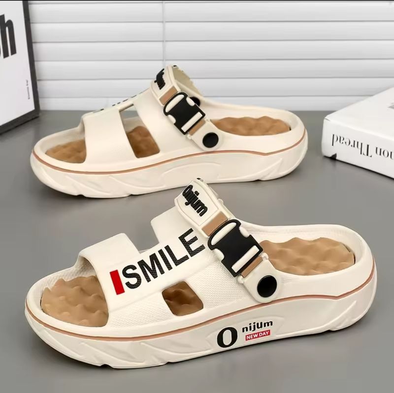 Experience ultimate comfort with Smile Comfort Massage Slides! Unisex EVA sandals with platform design, perfect for Jamaica&#39;s heat. Enjoy relaxing foot relief today!