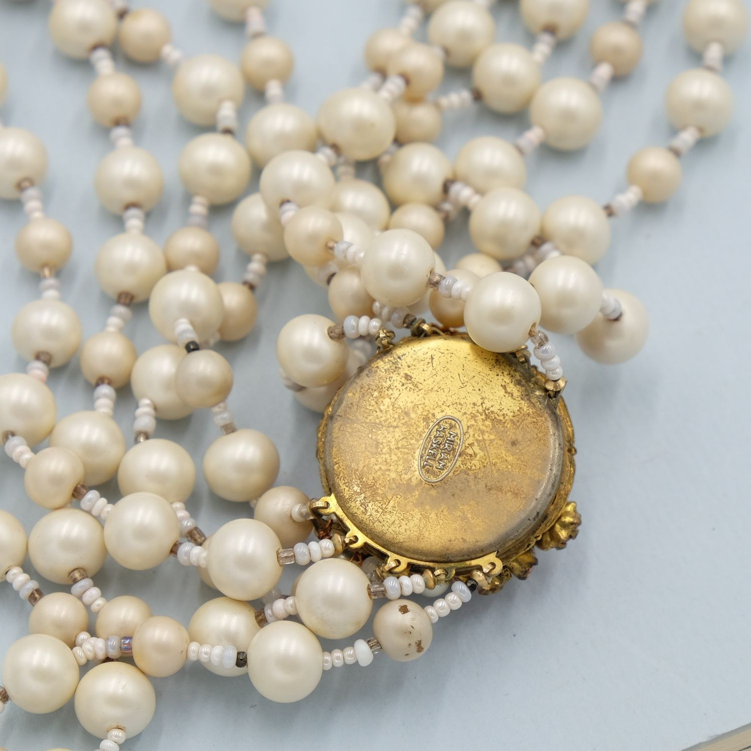Miriam Haskell 5 strand matte pearls with large pink clasp necklace 1960s