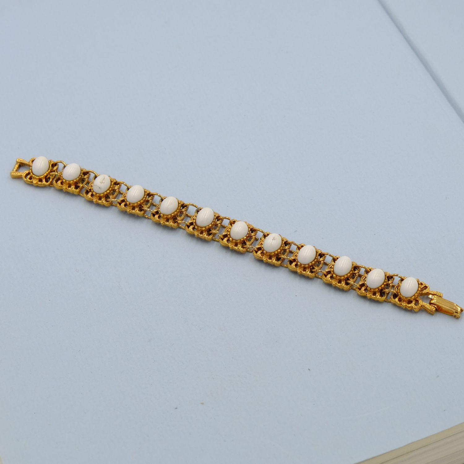 White Robin Egg gold tone bracelet 1970s