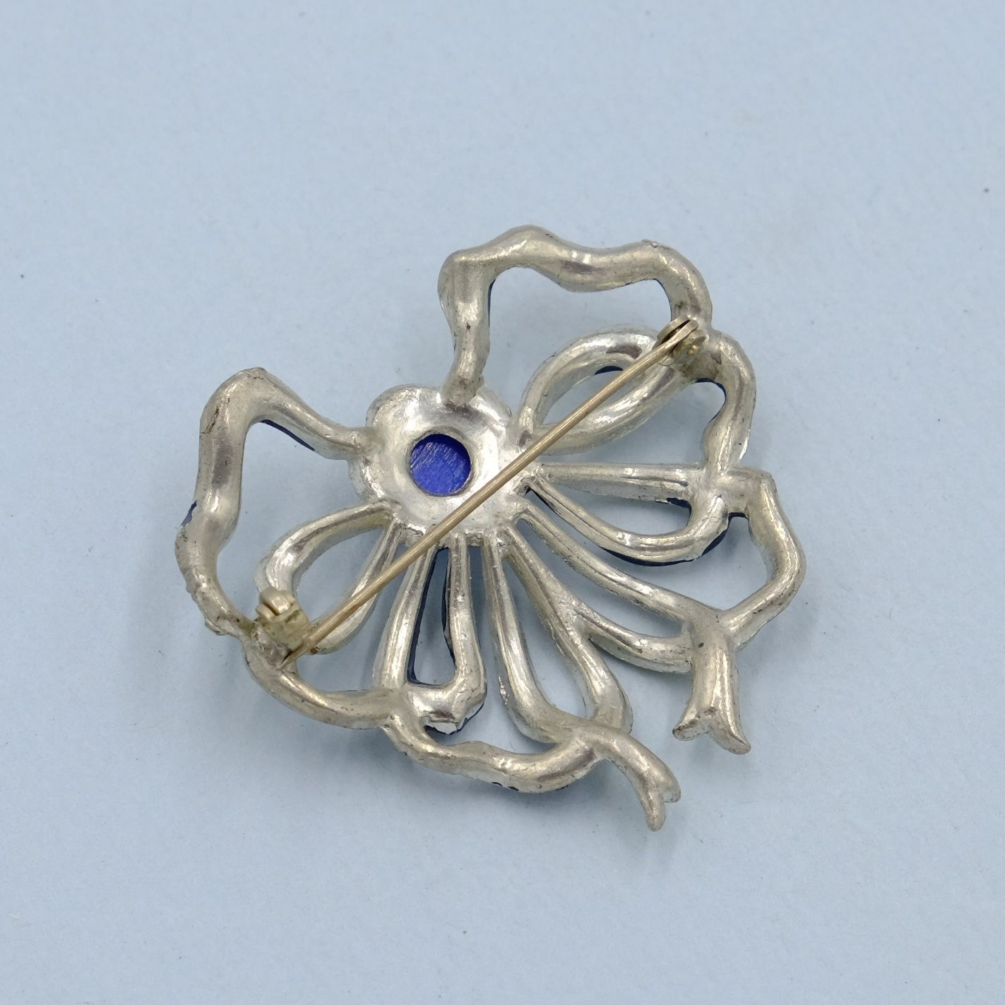Early Pot Metal Bow with Blue Enamel 1930s