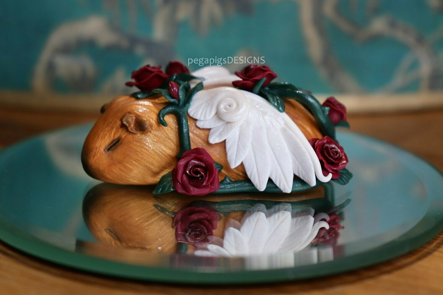 Big Sleeping Beauty Pegapiggy figurine with red roses made with Fimo (guinea pig with wings)