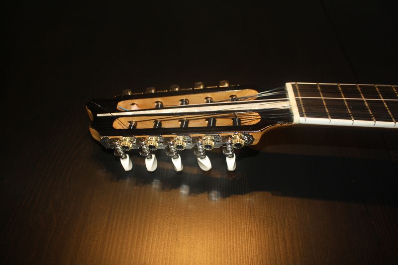 B41 - Bolivian Charango w/carved natives and llama