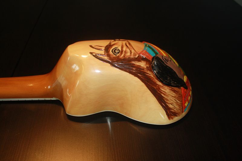 B42 - Charango Boliviano w/carved and handpainted natives and llama
