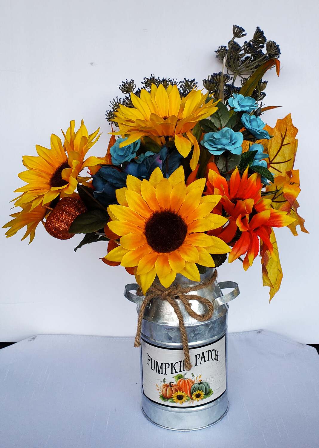Fall Teal, Orange, and Yellow Flower Arrangement