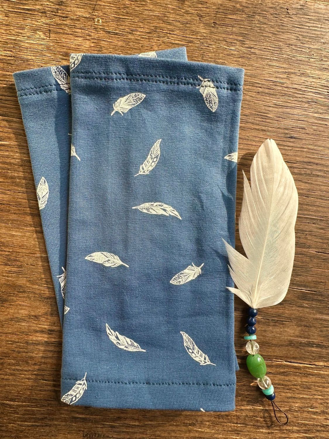 Feder Pulswärmer Feder Pulswärmer