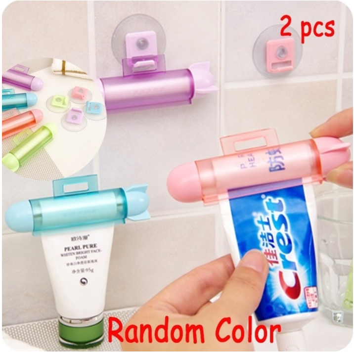2pcs/set ABS Cute Rolling Squeezer Toothpaste Dispenser Tube Partner Hanging Hol