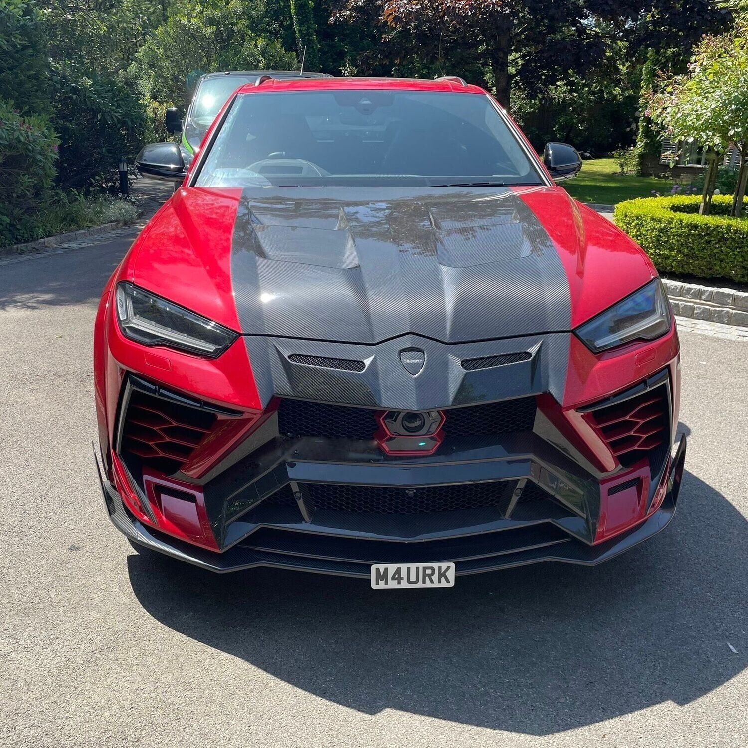 Lamborghini Urus with Mansory wide body kit , front license plate mount