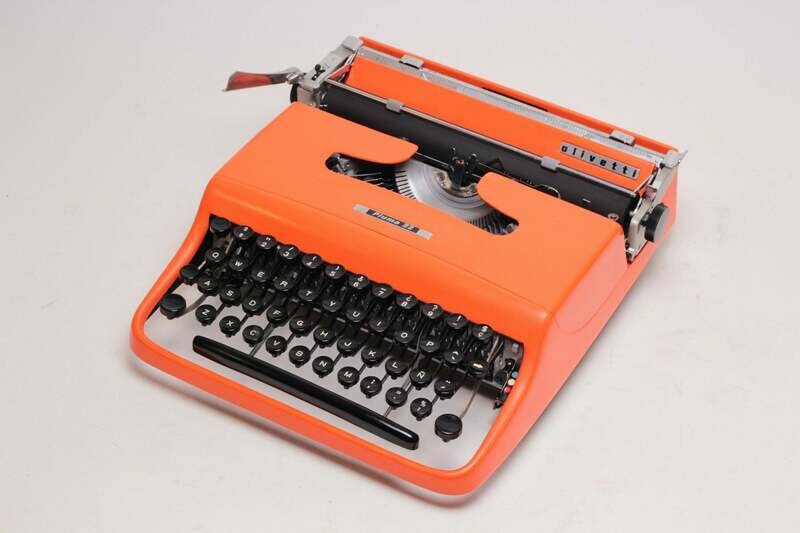 Olivetti Pluma 22 Orange Typewriter