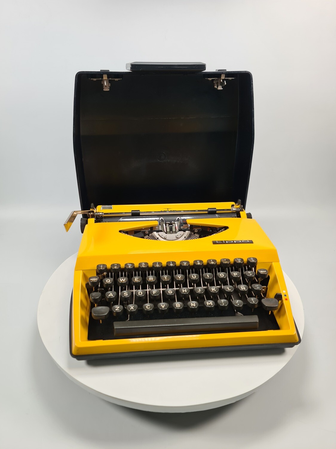 Adler  Tippa, yellow typewriter