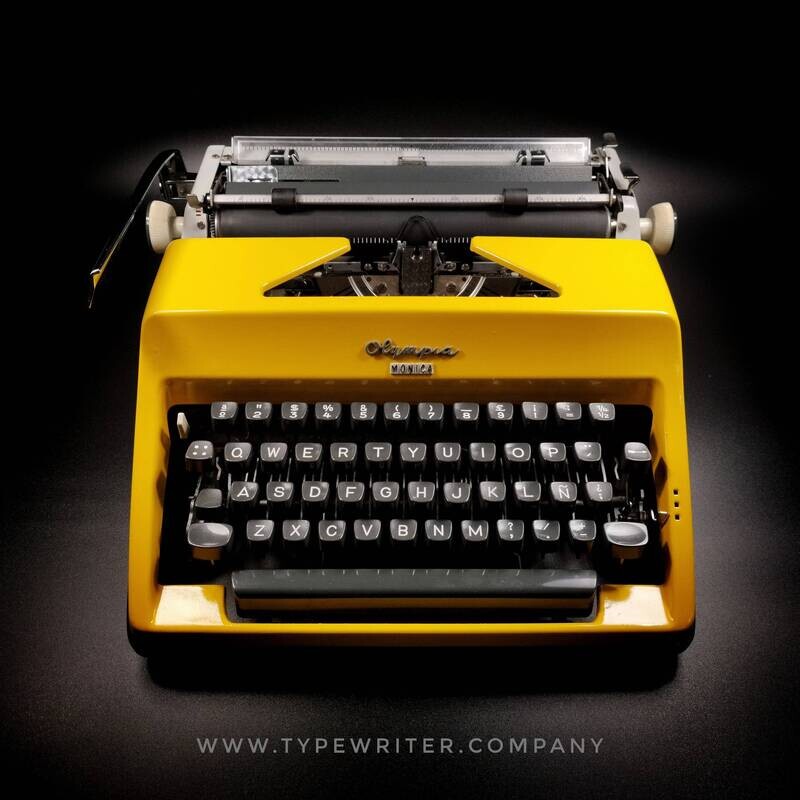 Olympia SM Glossy Yellow Vintage Manual Portable Typewriter, Serviced