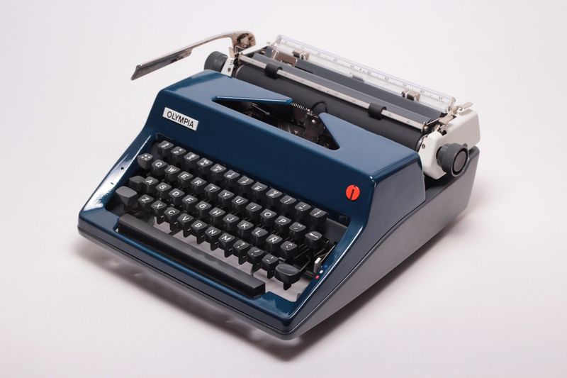 Olympia SM Navy Blue Vintage Manual Portable Typewriter, Serviced