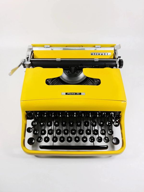 Olivetti Pluma 22, Pro Yellow Manual Vintage Typewriter, Restored