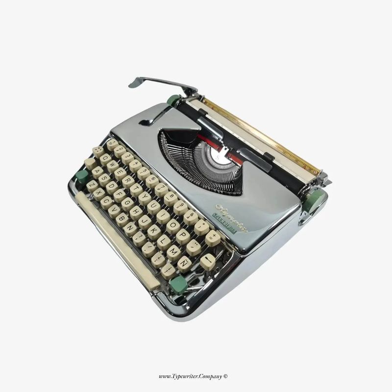 Olympia Splendid Vintage Typewriter, Chrome-Plated, QWERTY Keyboard, Restored