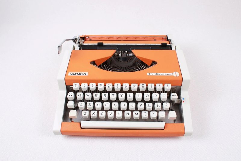 Olympia Traveller Orange Typewriter, Vintage Manual, Refurbished