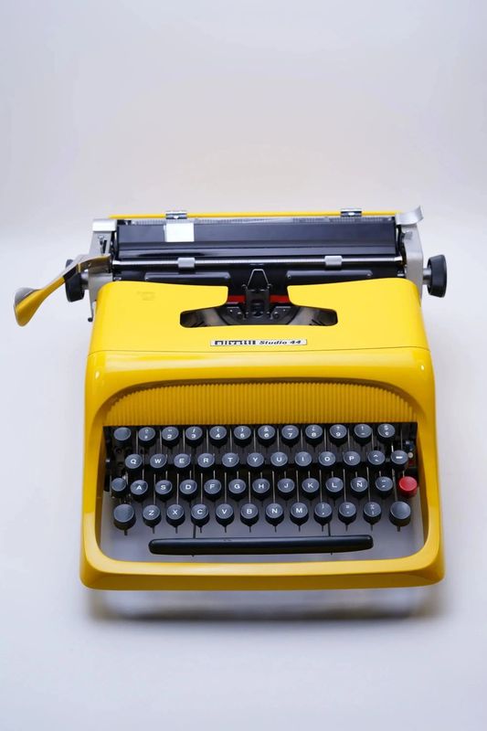 Olivetti Studio 44 Glossy Yellow, Vintage Manual Typewriter, Restored