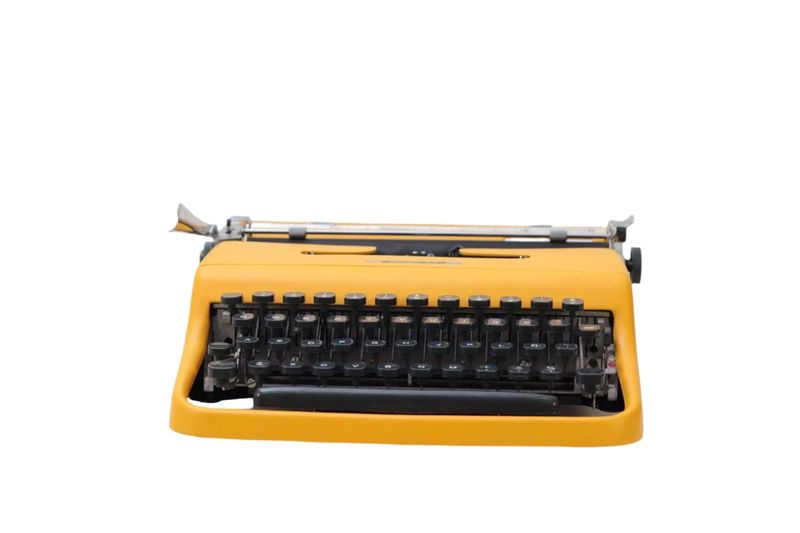 Olivetti Pluma 22 Yellow, Vintage Manual Typewriter, Refurbished