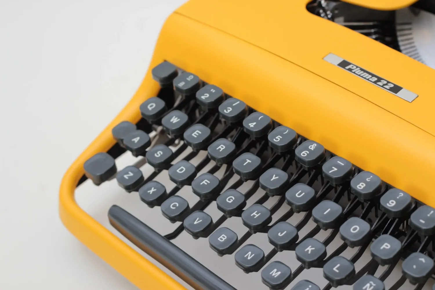 Olivetti Pluma 22 Yellow, Vintage Manual Typewriter, Refurbished