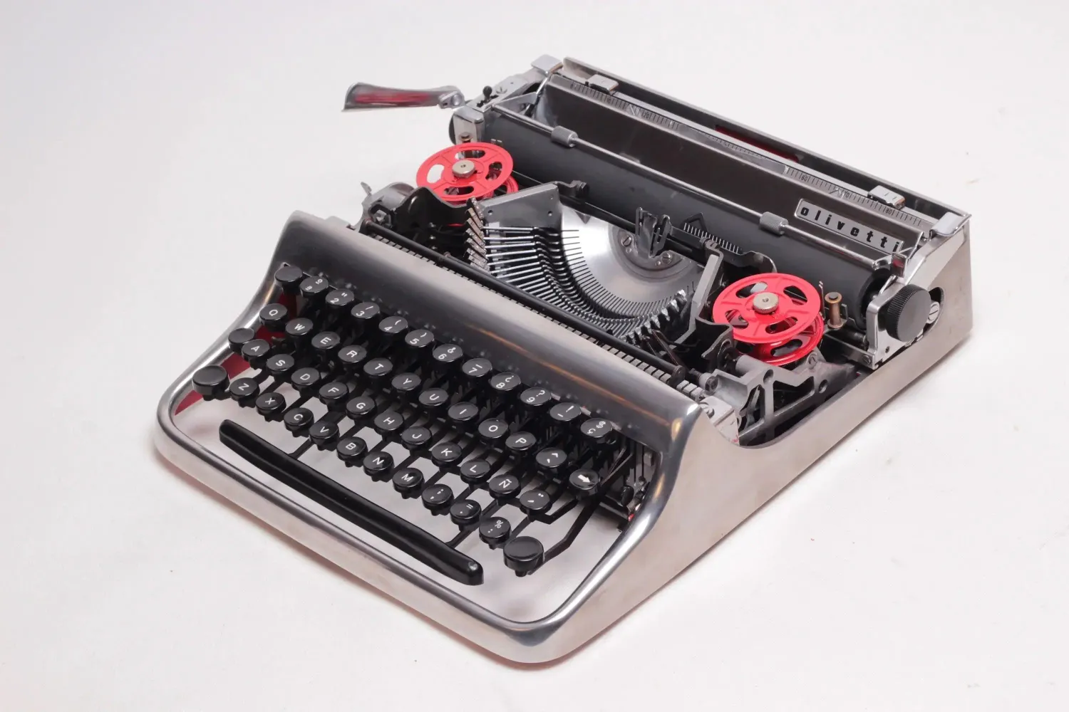 Olivetti Pluma 22, Polished Silver Manual Vintage Typewriter, Restored
