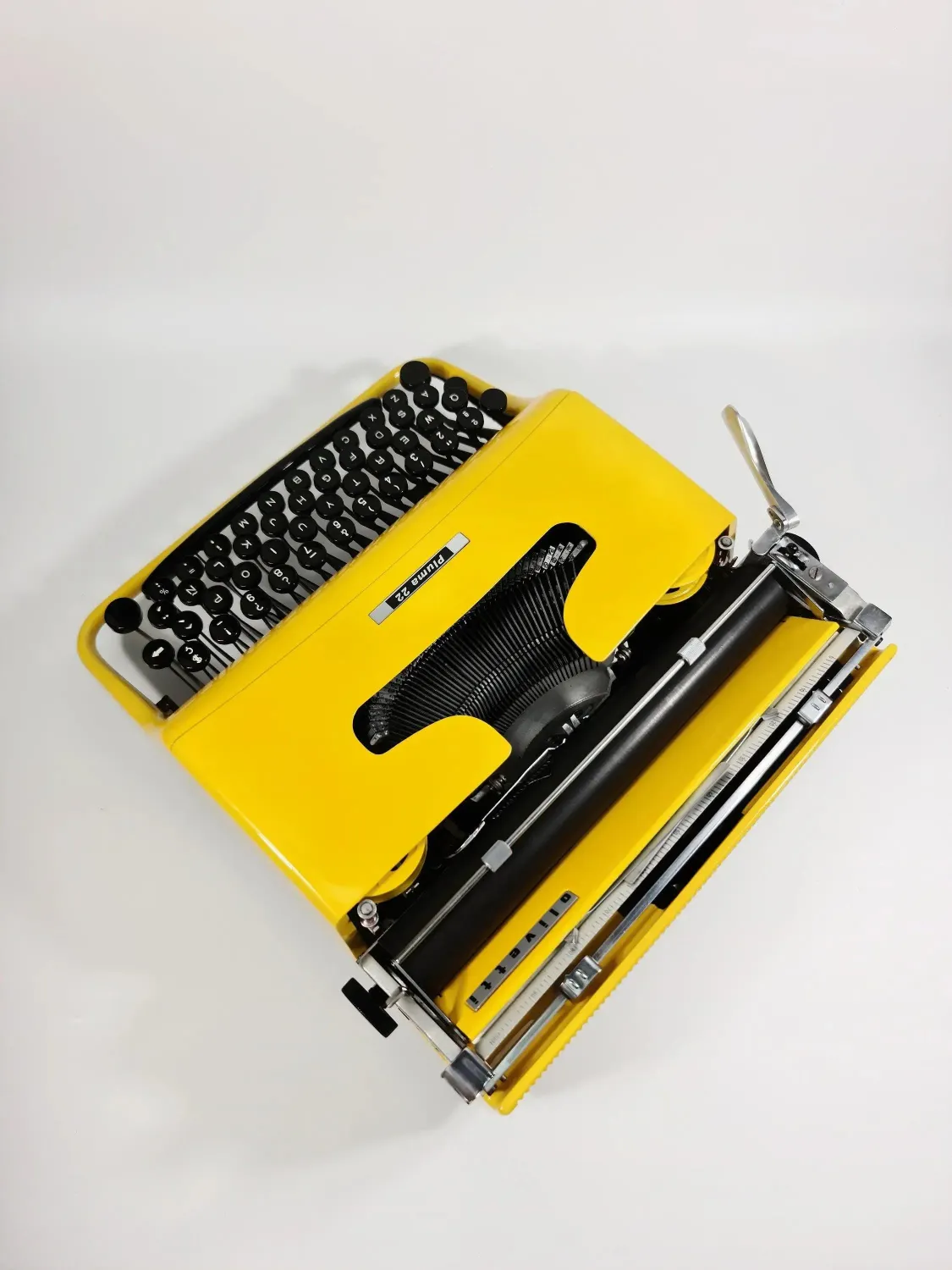 Olivetti Pluma 22, Pro Yellow Manual Vintage Typewriter, Restored