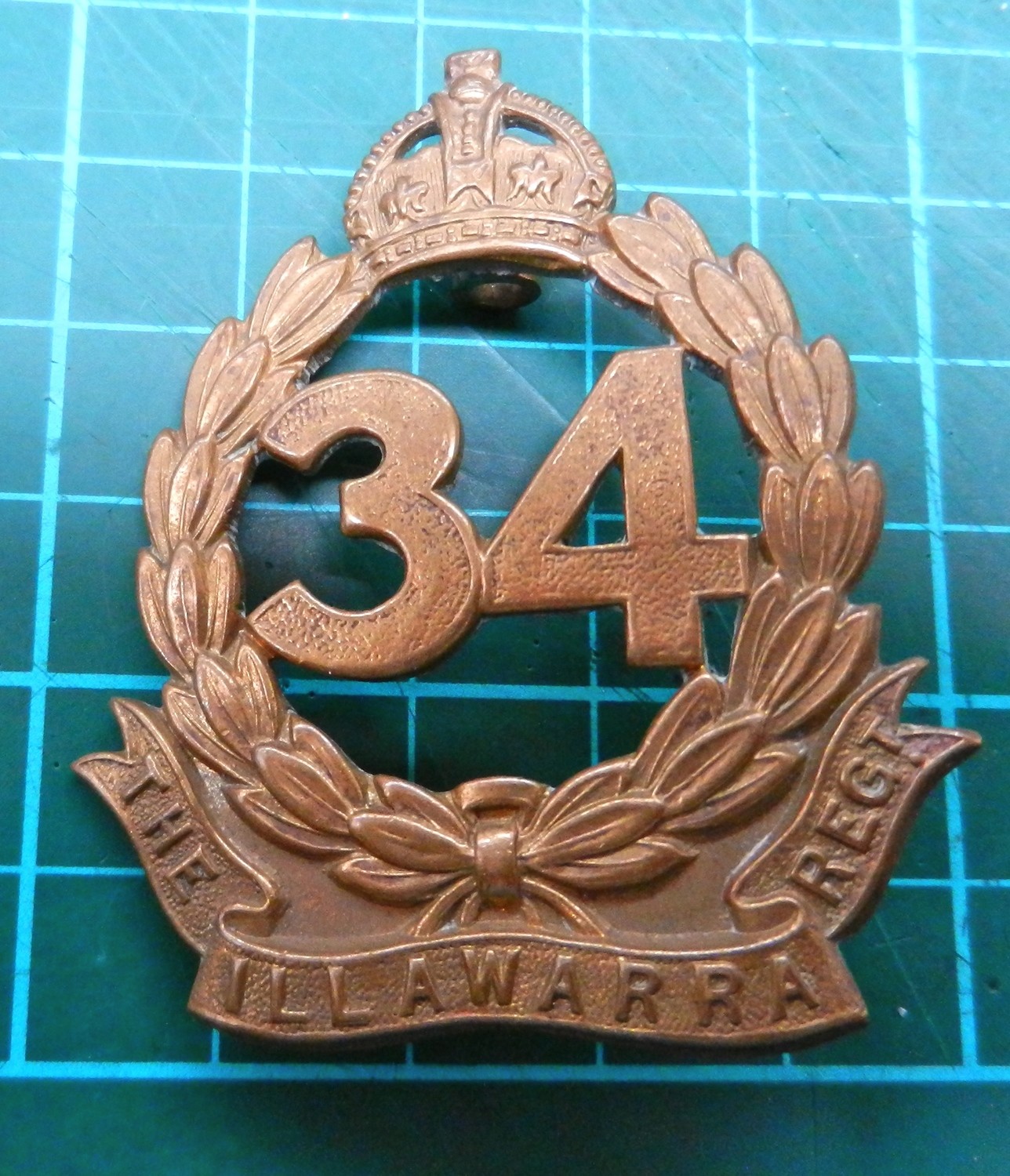 34th Infantry Battalion  1930-42 hat badge.
