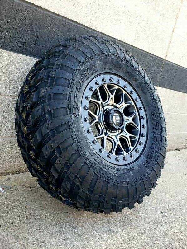 Fuel Tech D919 15x7 4x136/4x137 38mm Gunmetal Wheels & EFX Gripper 32x10R15 Dot Tires
