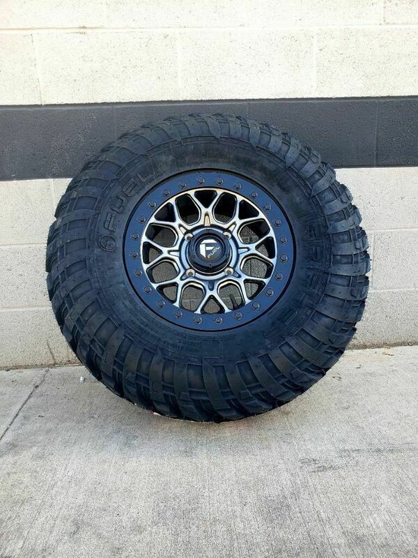 Fuel Tech D919 15x7 4x136/4x137 38mm Gunmetal Wheels  & EFX Gripper 30x10R15 Dot Tires